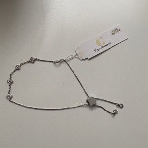 Charming Charlie’s adjustable bracelet with charms